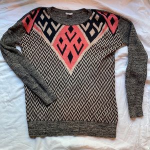 Small black orange and tan sweater